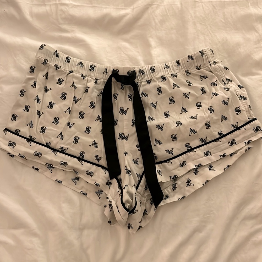 Victoria’s Secret white pajama shorts with black print, size small